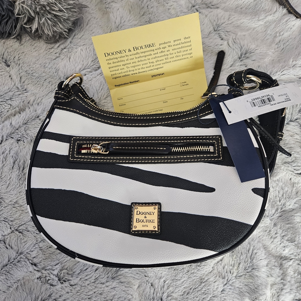 Dooney & Bourke Black and White Zebra Print Crescent Bag. 10.5L 7"H x 2.4D.  9.5